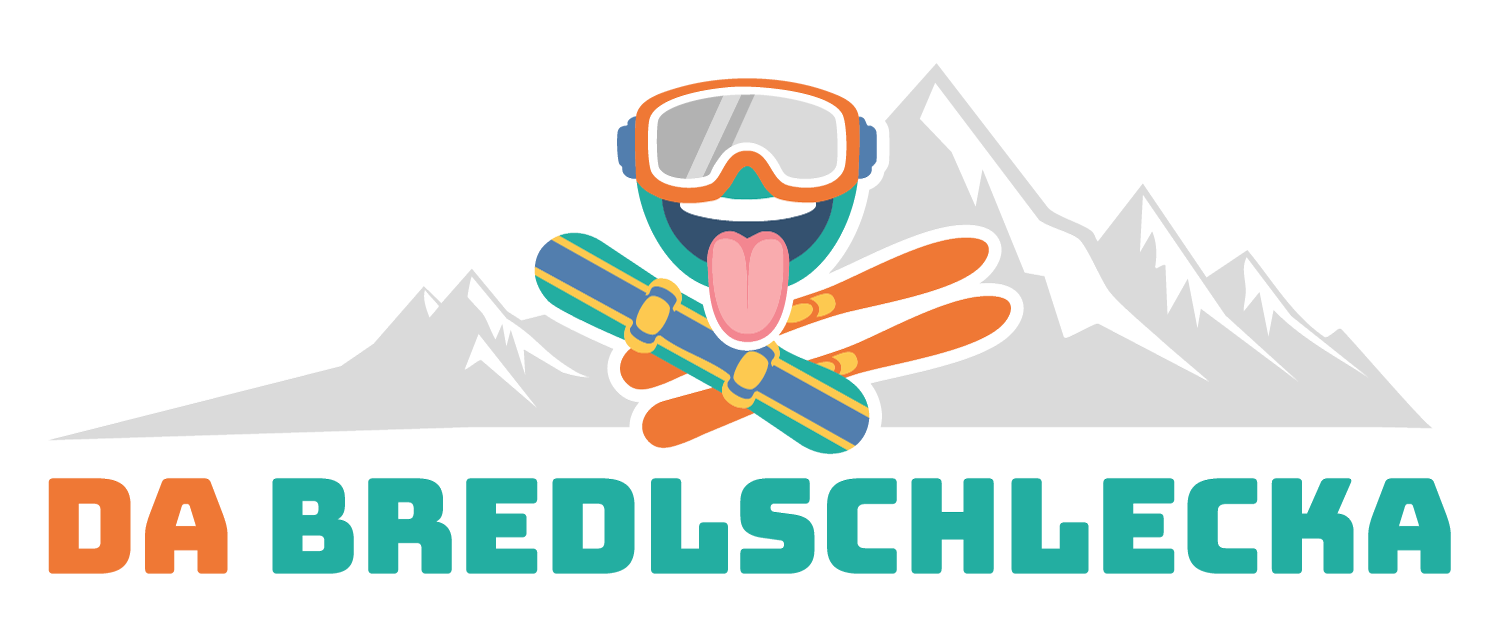 Ein Smiley mit Skibrille und mit herausgestreckter Zunge, die über ein gekreuztes Snowboard und ein Paar Ski hinausragt. Im Hintergrund sind grafische Berge zu sehen, die schneebedeckte Gipfel darstellen, darunter steht ein Text Da Bredlschlecka.