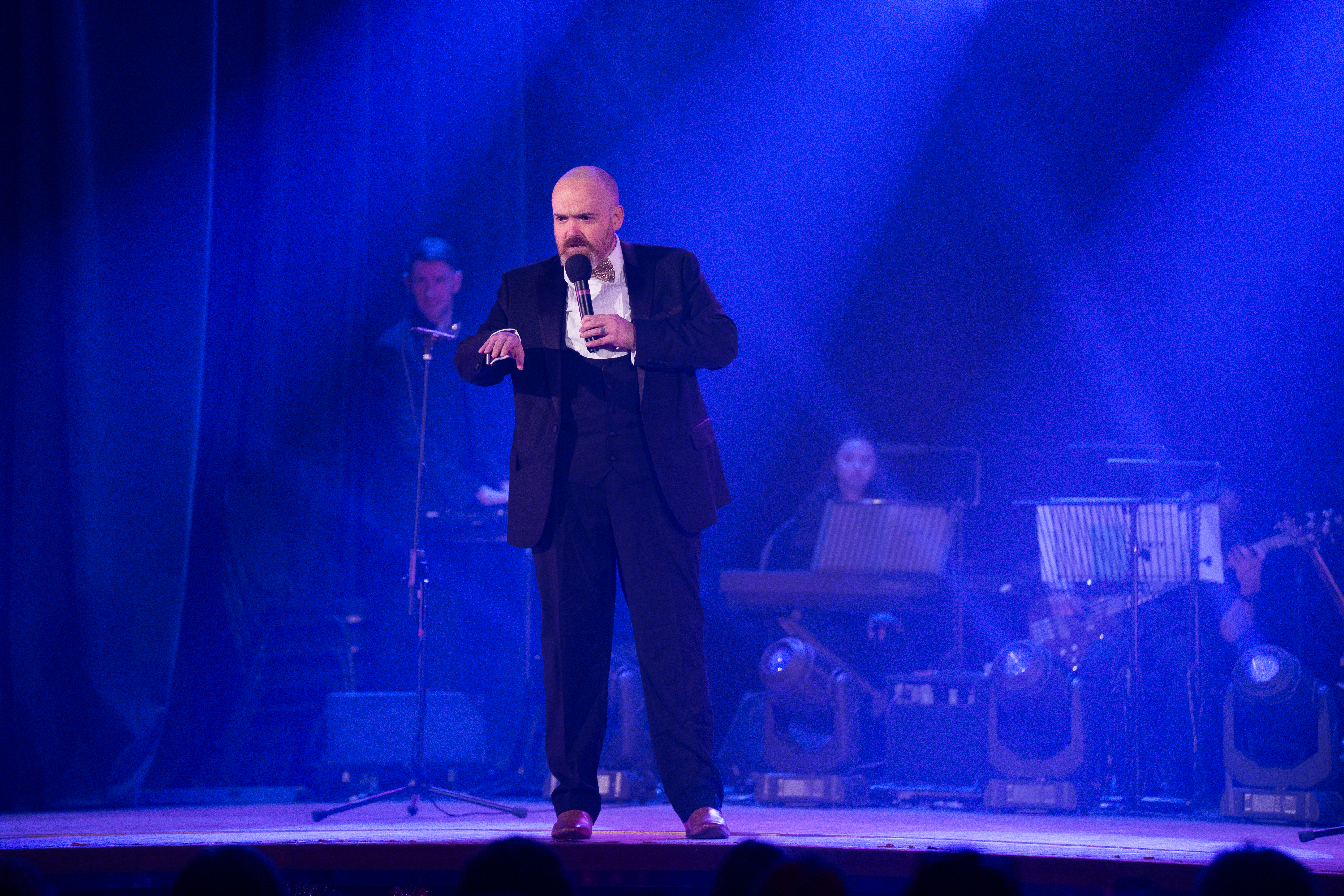 Chris presenting on stage