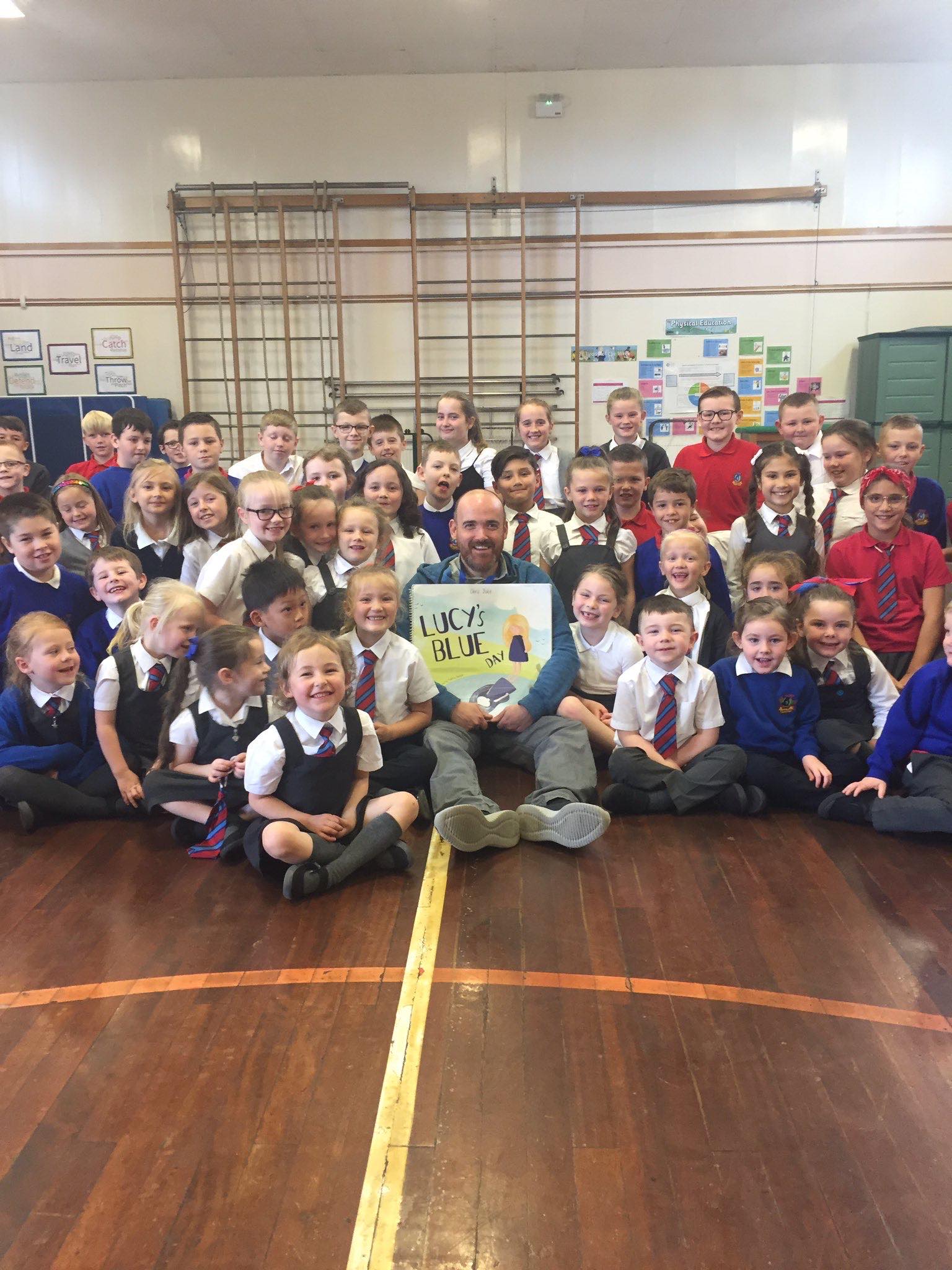 Chris with a class reading Lucy's Blue Day