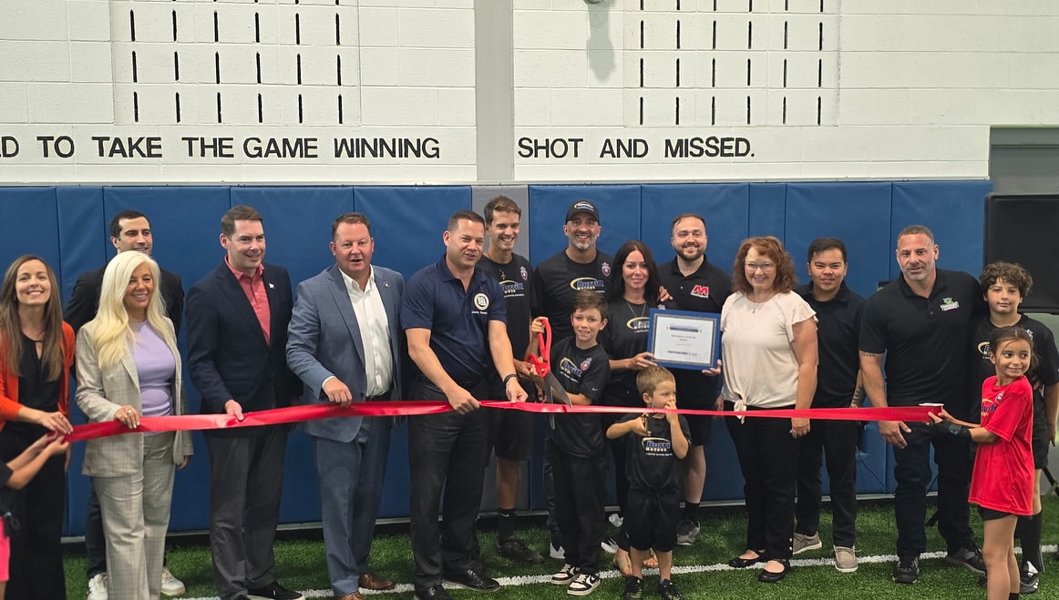 Bogdan SKLZ grand opening ribbon cutting