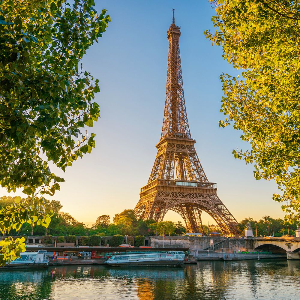 The Eiffel Tower above the Seine at sunrise