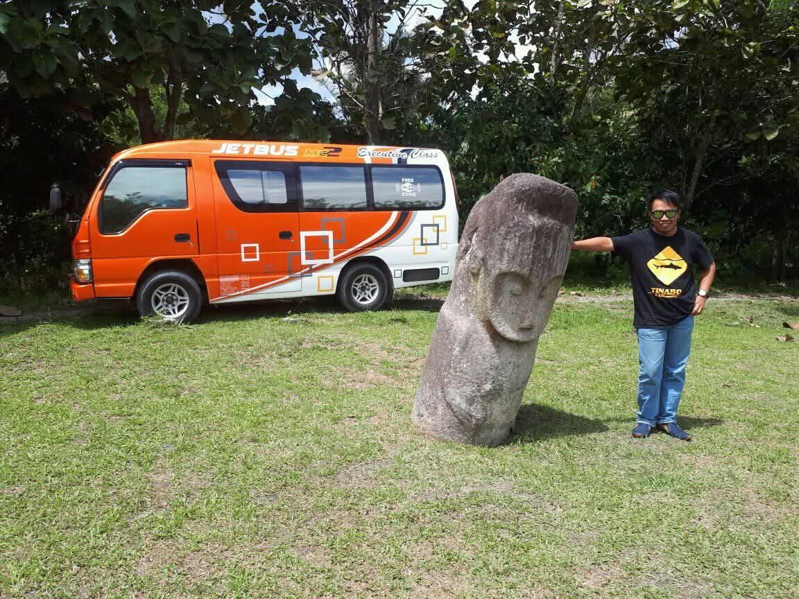 Ancient megalith statue in Bada Valley, Central Sulawesi