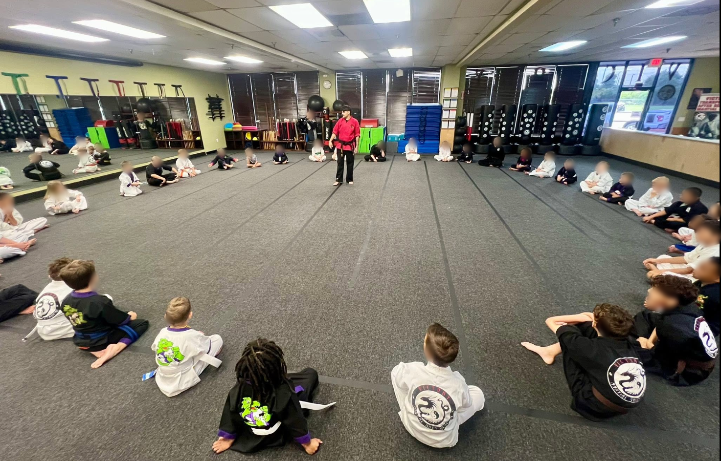 Young students practice together with Sensei Brad.