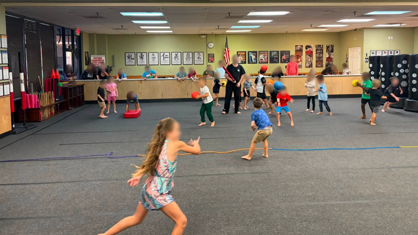 Campers take part in an active game inside the academy.