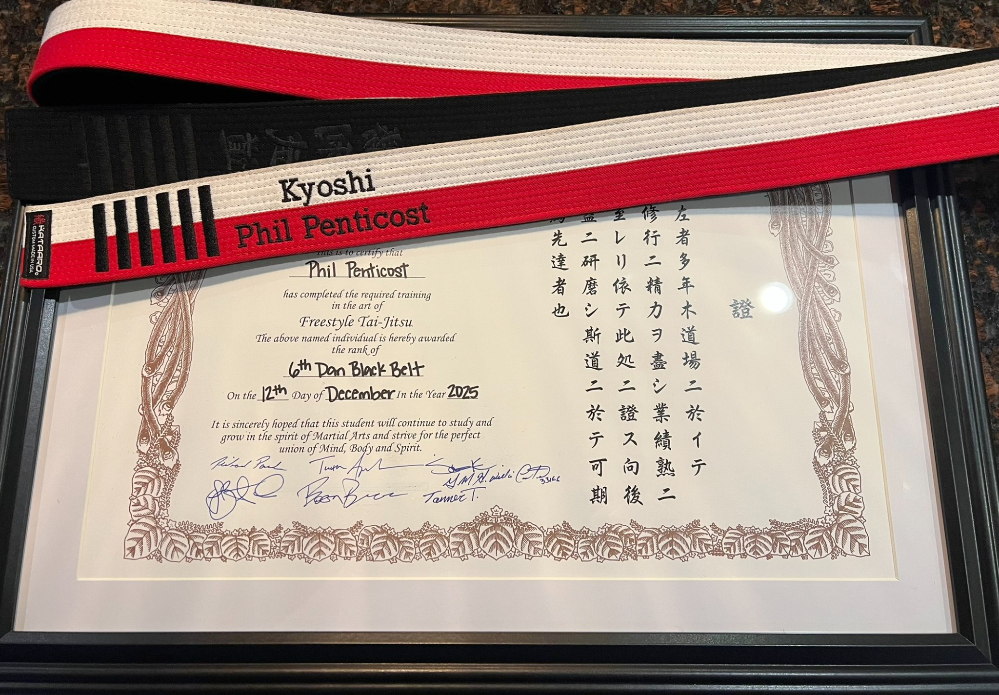 Kyoshi Phil’s sixth degree black belt and certificate.