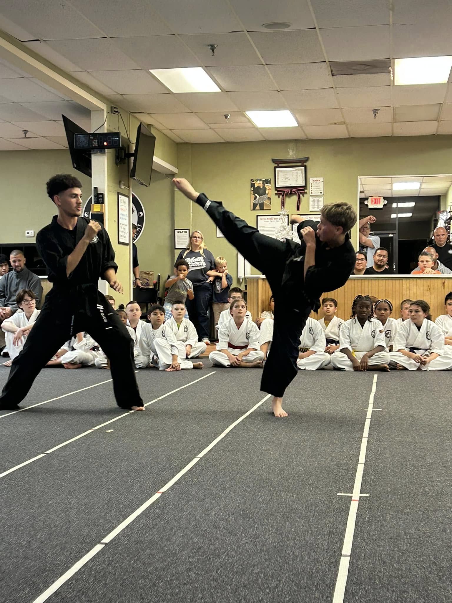 Students demonstrate their training during a test.