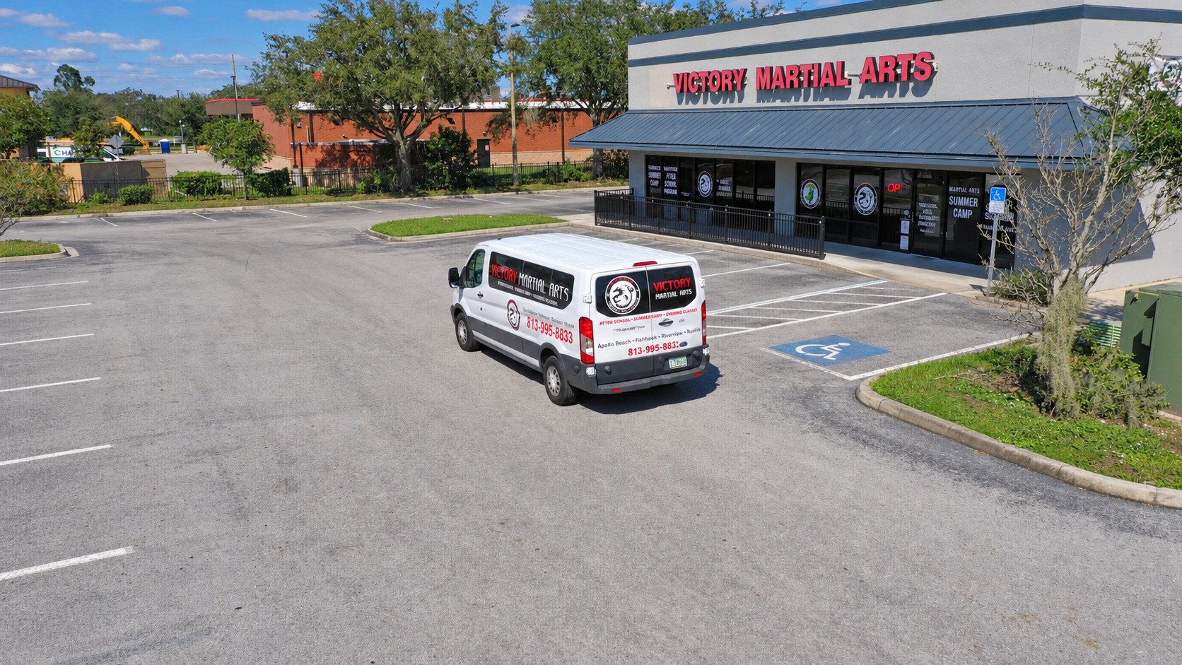 A Victory Martial Arts Academy van outside the Riverview dojo.