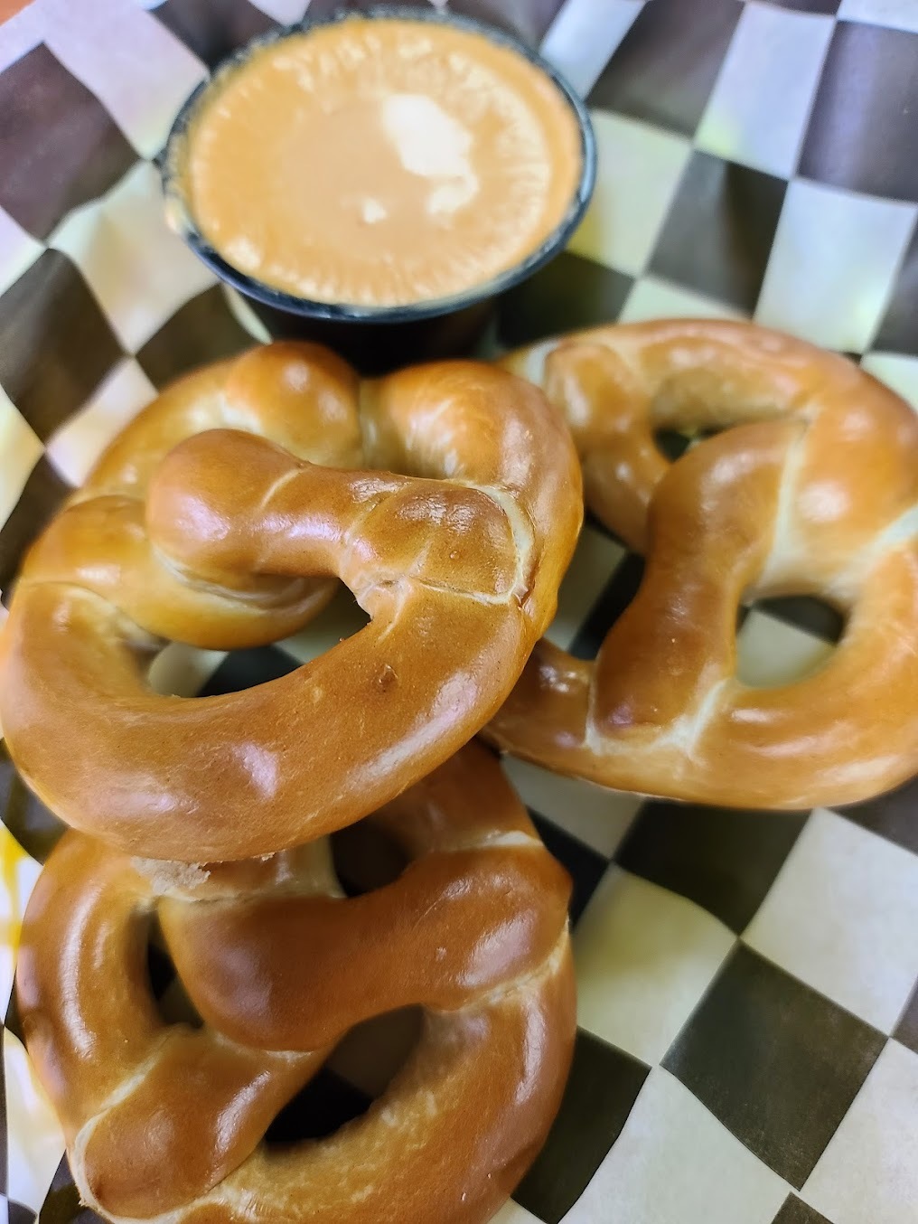 Oven-baked pretzels served with warm beer cheese.