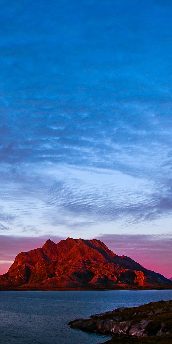rød solnedgang over Dønnamannen