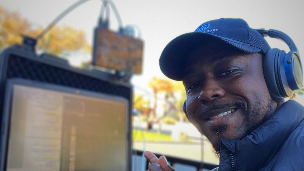 "Team member running live stream at remote location."