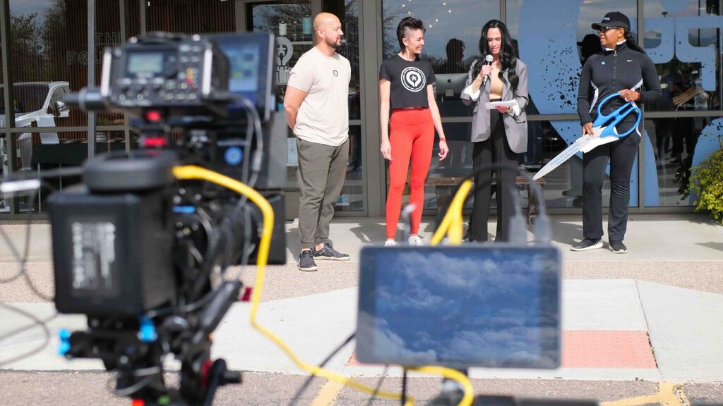 “Ribbon‑cutting ceremony at a local business with chamber officials.”