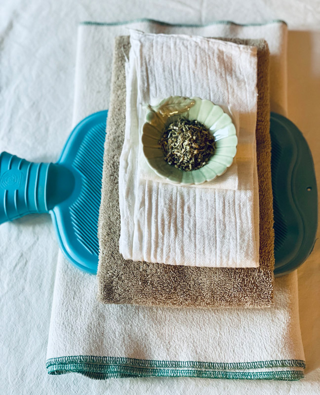 Wickel und kompressen mit Bettflasche