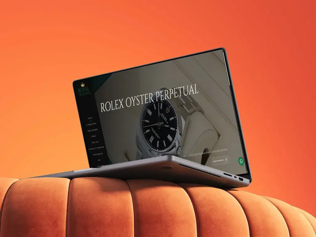 Website Mockup Laptop auf orangenen Hocker