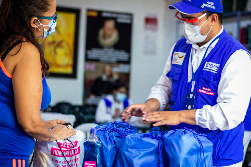 Employee giving aid to a lady