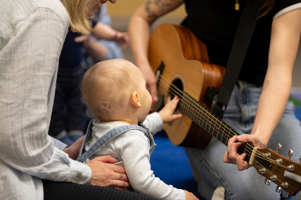 Parents and kids in a Melodies and ABCs class from Prelude Music