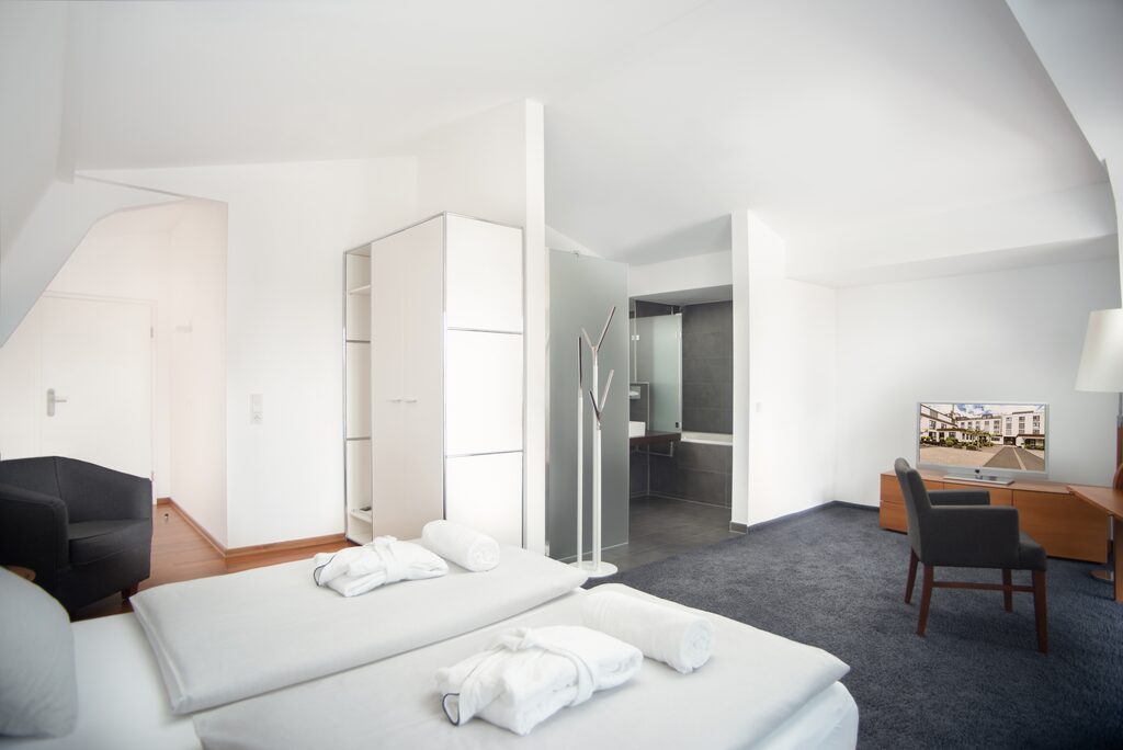 Photo of a loft with a view of the bathroom