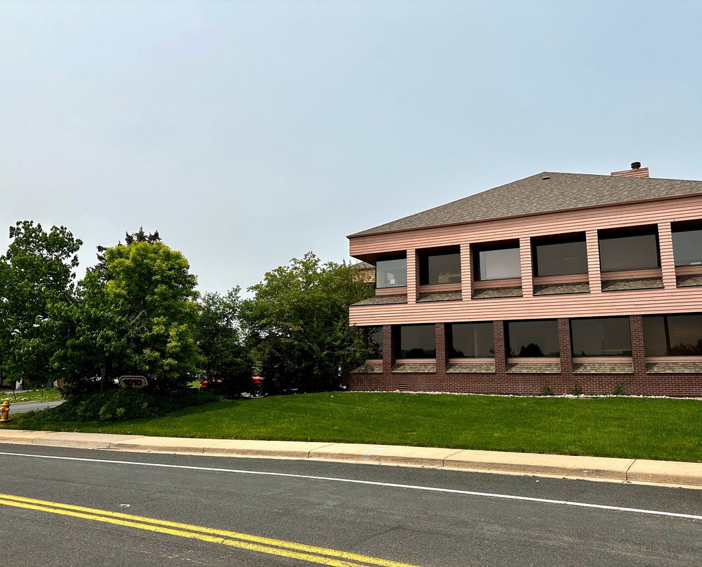 Exterior view of Painless Stride wellness clinic in Broomfield, Colorado