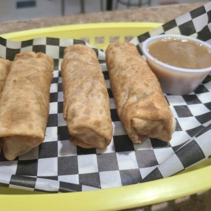 Apple Pie Eggrolls, served with a side of warm caramel sauce. Click this image to see all of our desserts. 