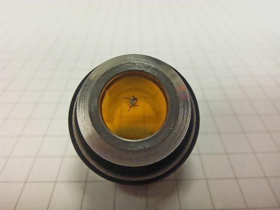 Cleaning and alignment of a CO2 laser output coupler under workshop conditions with micrometre precision