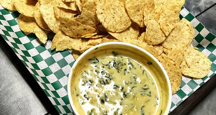 A deep-dish "Chi-Pie" pizza, loaded with cheese and sauce.