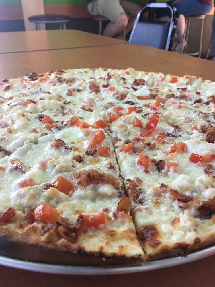 Abe's Place exterior in golden light from the sunset.