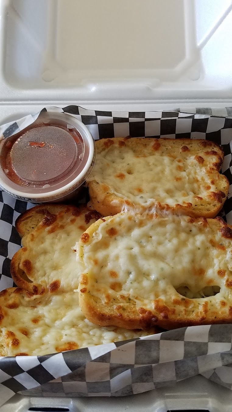 A deep-dish "Chi-Pie" pizza, loaded with cheese and sauce.