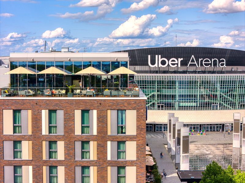 Gallery Rooftop Bar Berlin terrace with Uber Arena in the background