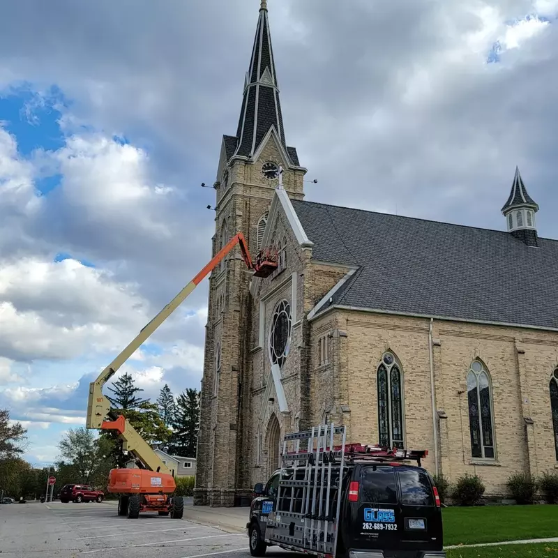 Way up high in the boom lift working on St. Peter's Church.