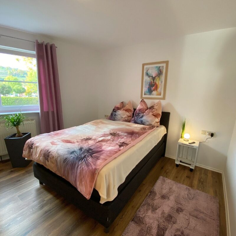 Das Apartment: Schlafzimmer mit Doppelbett