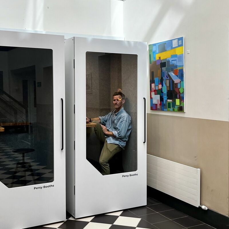 Our campaigns lead for Northern Ireland trying out some new working pods

(Picture of Andrew sitting in a white noise-cancelling booth designed for co-working spaces)