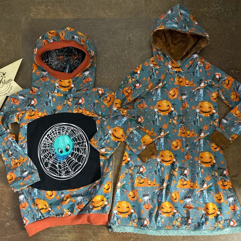 Kinderpullover und passendes Kleidchen
