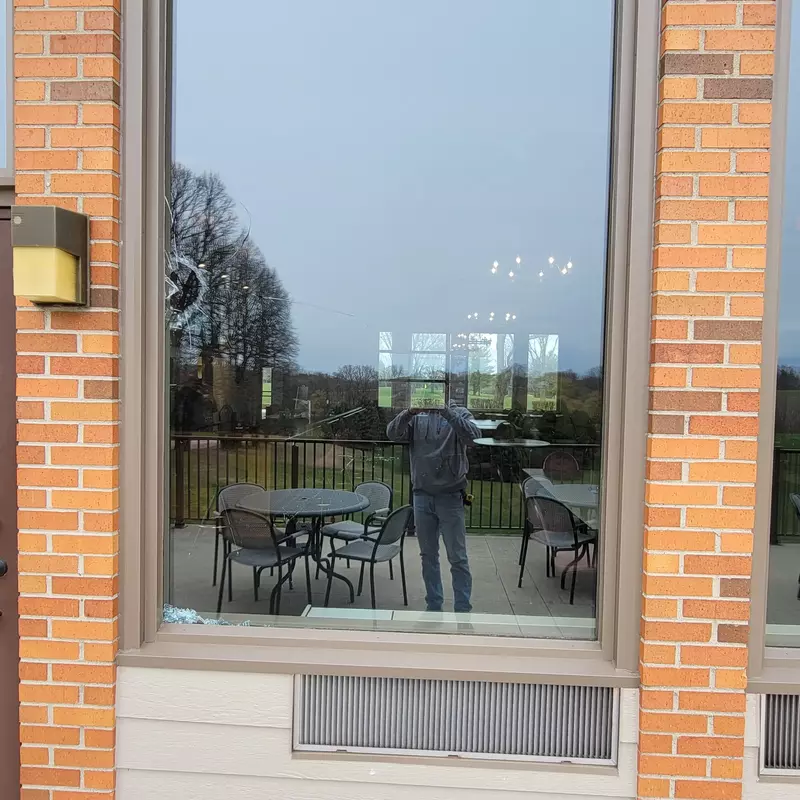 Front View — Broken Window.