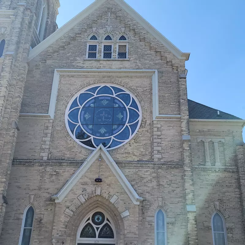 Church glass window in need of repair.