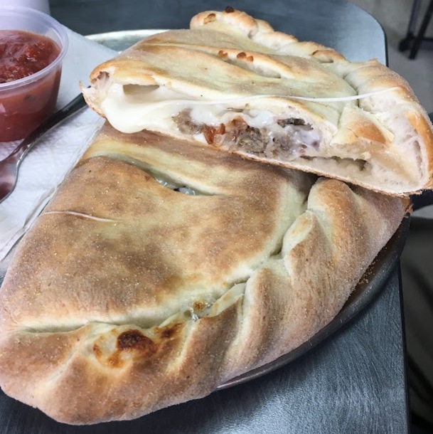 Beef Calzone served with our marinara sauce, made in-house.