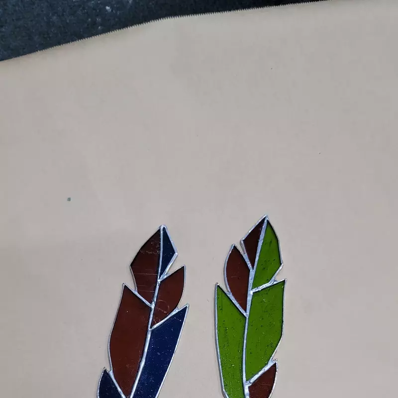 Feathers With Custom Colored Glass Inserts.