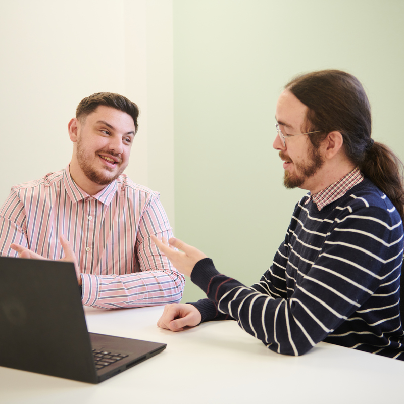 Employees conversing 