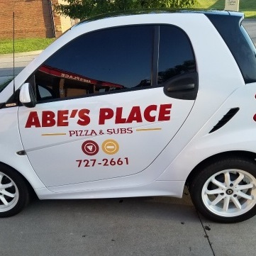 Abe's iconic white delivery car.