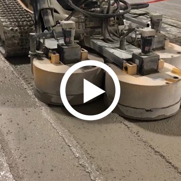 Bobcat w/Three Headed Grinding Attachment